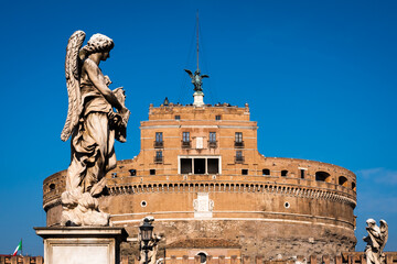 Obraz premium The castle Sant Angelo an the statue of the bridge in Rome