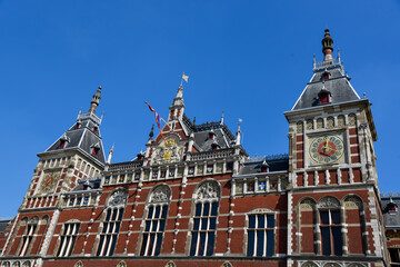 Amsterdam, the Netherlands - April 2020. Historic facade of Amsterdam Central Station