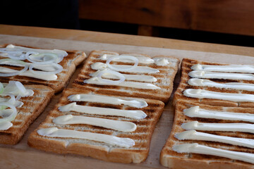 the cook makes sandwiches. assembling the ingredients for sandwiches with a cutlet. best breakfast. snack