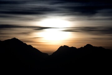 silhouette landscape view of sunrise over the mountains 
