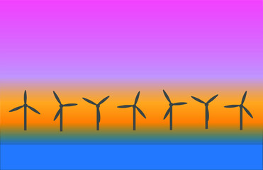 Off shore wind turbines at sunset.