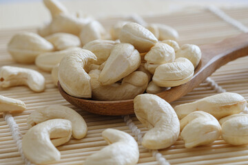 Cashew nuts   on the wood floor bamboo,close up