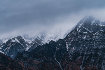 Fototapeta na wymiar Black cloudy Himalaya mountains