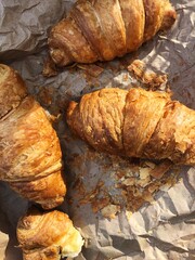 Delicious fresh croissants on a picnic macro