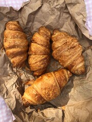Delicious fresh croissants on a picnic macro