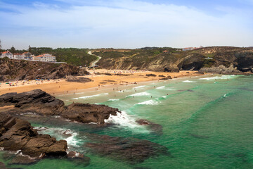 Fototapeta na wymiar Beautiful beach with waves in Alentejo, Portugal