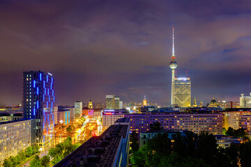 Obraz premium Berlin sunset cityscape aerial view with tv tower in heavy storm conditions