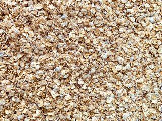 Oatmeal, rolled oats health food background texture