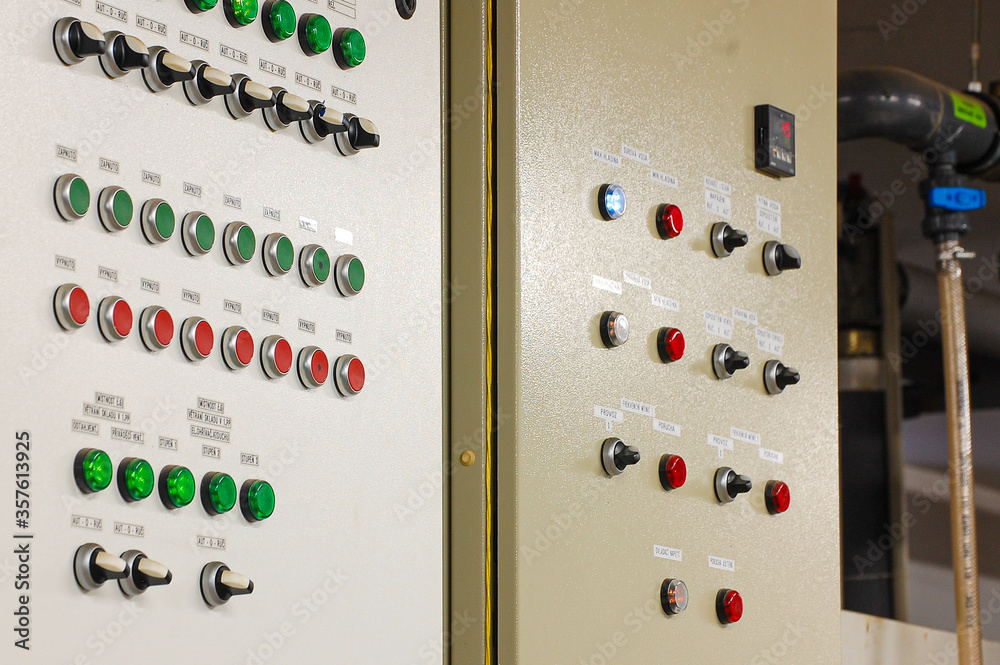 Poster switches on an industrial control board. lamp indicator and switch of power control panel.