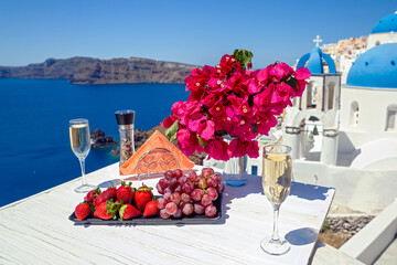 Wine and fruit on the table for two