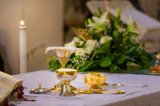 altar with host and chalice with wine in the churches of the pope of rome, francesco