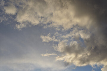 Stormy rain big fluffy clouds. Dark sky. Natural scenic abstract background. Weather changes...