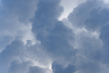 Stormy rain big fluffy clouds. Dark sky. Natural scenic abstract background. Weather changes backdrop. Sky filled with voluminous clouds.