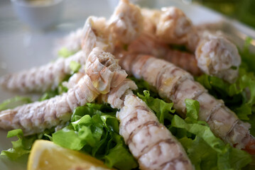 Boiled mantis shrimp with lettuce and dips