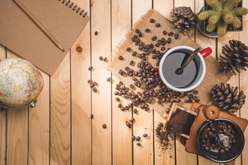 Cup Of Coffee, beans roating and Ingredients for making coffee  and accessories with map world. relax