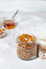 homemade granola with coconut and nuts, vertical