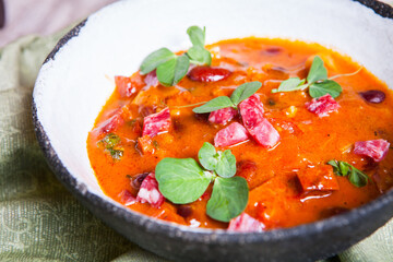 Classic chili with meat and herbs in a bowl