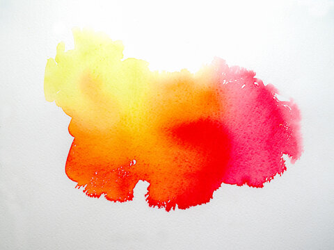 Abstract watercolor effect, splash texture yellow, orange and pink color. Painted by hand on white background.