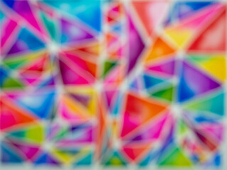 Blurry Hand painted colorful watercolor triangle pattern with white line in between.