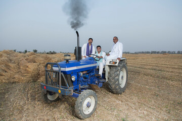 Farmer sitting on tractor