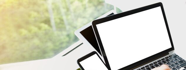 Close up of woman using cell phone and laptop,sending massages within the cafe.having sunbath.Phone with black screen,texting,video calls.-banner.