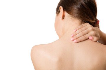 woman back pain neck pain. Back view. Copycpase