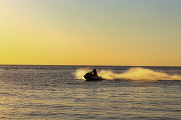 sunset on the sea,running on the waves