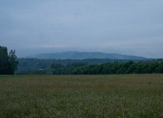 Fototapeta na wymiar central hessian landscape with rain and light fog in early summer