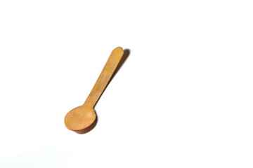 An isolated wooden spoon in a white background