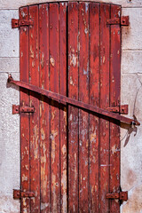 Old wooden and metal portal with lock. Vintage artistic design