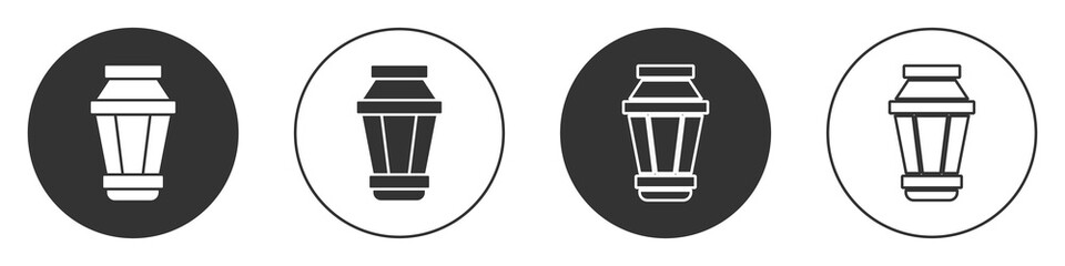 Black Garden light lamp icon isolated on white background. Solar powered lamp. Lantern. Street lamp. Circle button. Vector Illustration.