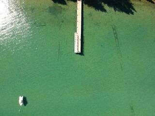 Aerial view of Pier at Lake Tahoe, forest and mountains