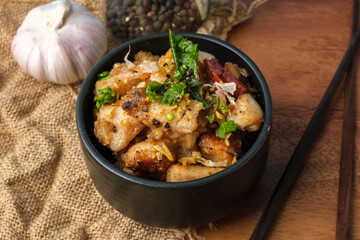 Fried chicken with garlic and pepper with rice. Thai Dish.