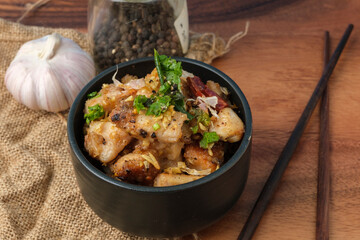 Fried chicken with garlic and pepper with rice. Thai Dish.
