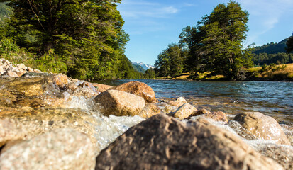 stealthy river flowing between mountains