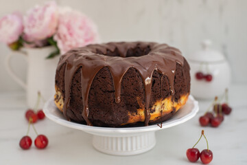 chocolate cherry sponge cake with chocolate frosting