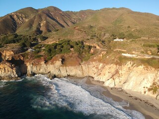 The California coast glows in late afternoon sun. Pacific Coast Highway.