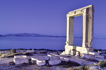 Ancient greek portal on Naxos island during the night.
