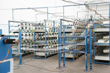 Yarn thread running in the machine