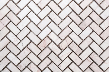 White or llight grey color marble stone wall texture or abstract background. Herringbone pattern.