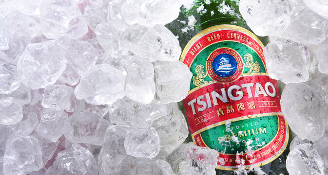 Two Bottles Of Tsingtao Beer In Crushed Ice