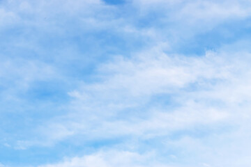 Fototapeta premium soft white clouds against blue sky background...Abstract nature background of beautiful clear blue sky in summer sunlight & sun rays for wallpaper & backdrop, gradient seamless pattern ..