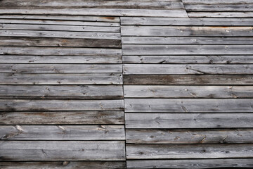 Obraz premium Textured background from an old wooden fence. Solid wood texture