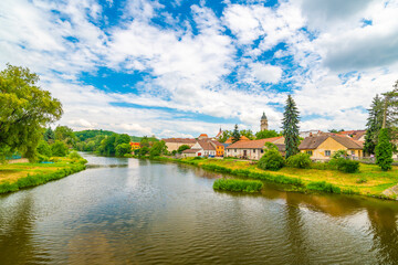 Fototapeta na wymiar Panoramic view of Dolni Kounice city, South Moravia region, Czech republic. Small city with river in the middle.