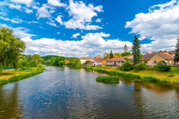 Naklejka na ściany i meble Panoramic view of Dolni Kounice city, South Moravia region, Czech republic. Small city with river in the middle.