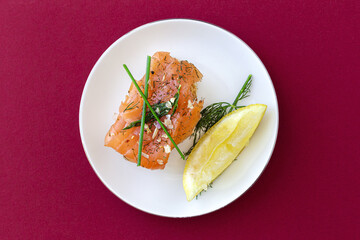 Norwegian smoked salmon canapes with lemon, blue cheese sauce, pepper and salt from above