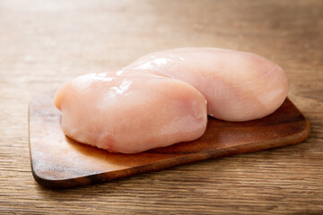 fresh chicken fillet  on wooden table