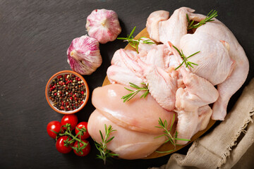 fresh chicken meat with rosemary, top view
