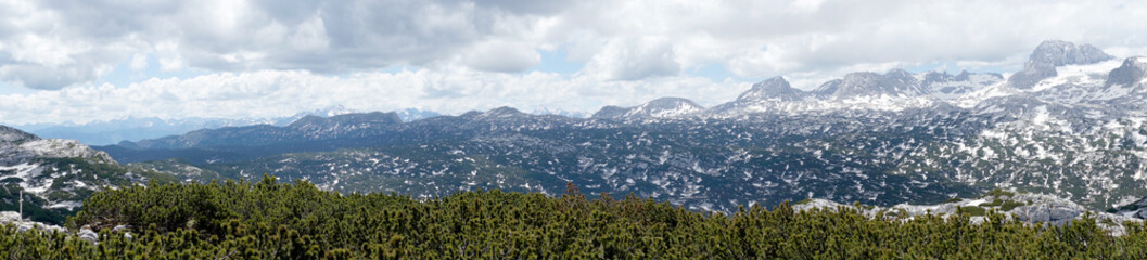 Panorama of the winter mountain landscape with high alpine peaks. Dachstein. Austria