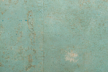 Old painted wall with cracked paint